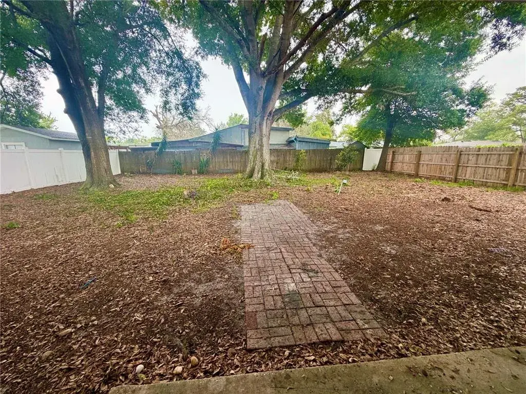 Expansive BackYard! Plenty of room for toys and a pool.