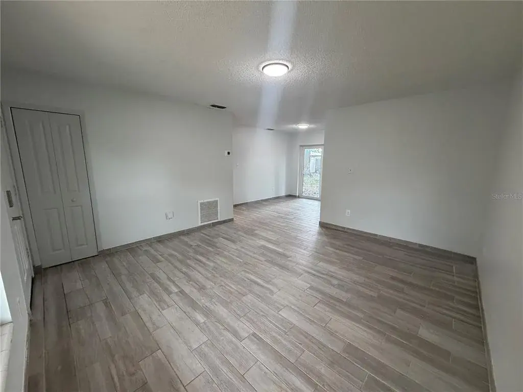 Living Large Living Room Opens To Dining Area