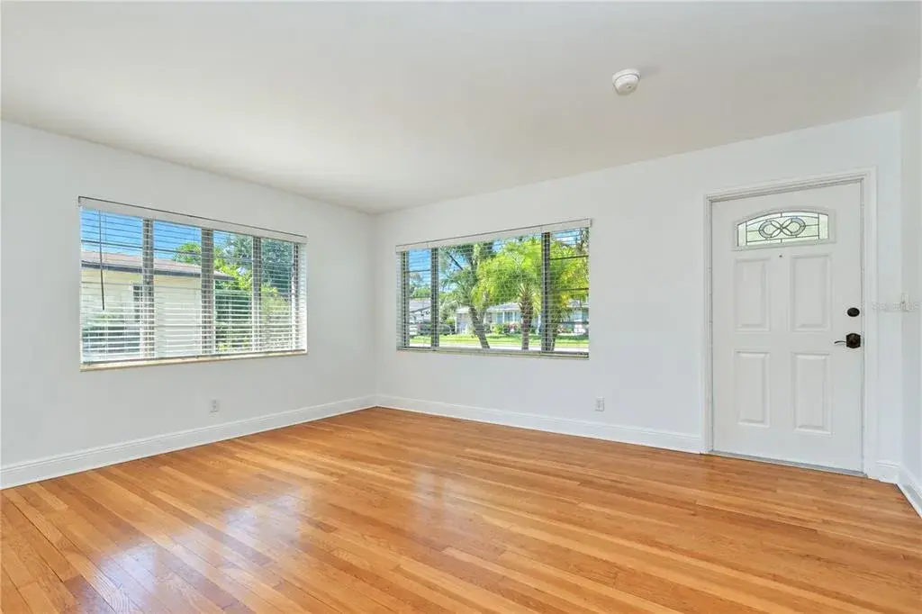 Beautiful wood floors create a warm and welcoming atmosphere throughout the home.