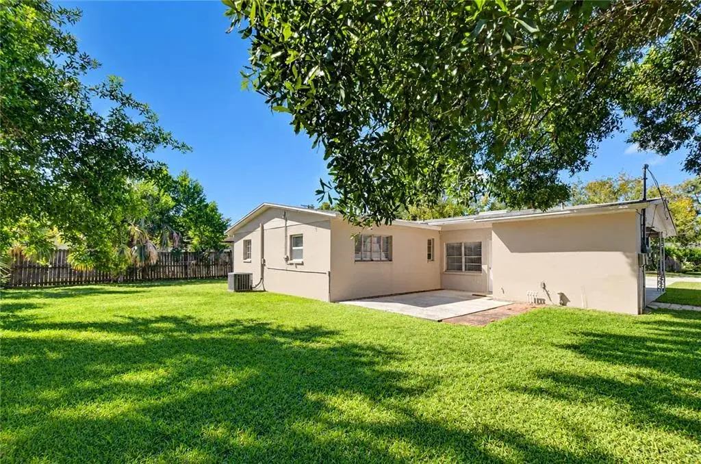 Spacious outdoor retreat offering room for pets, play, and relaxation.