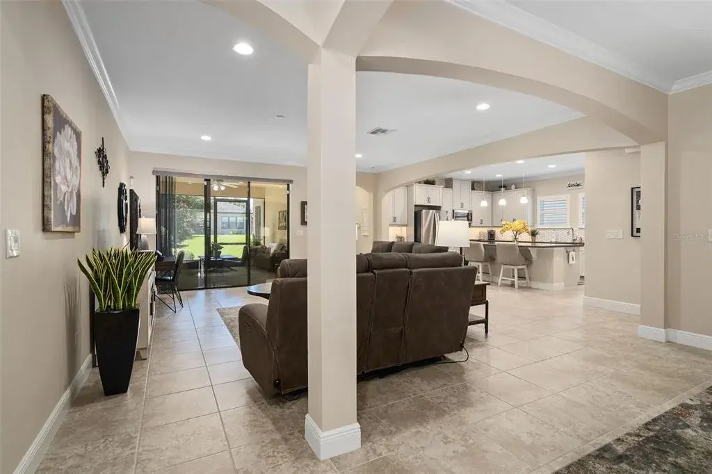 Open and Flowing floor plan with 9'-4" Ceilings and Crown molding. This is a great area for entertaining.