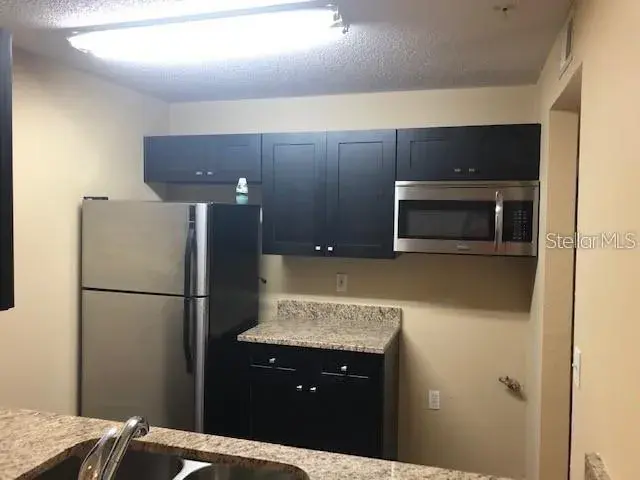 Property for sale at 2035 DIXIE BELLE DRIVE UNIT 2035T, ORLANDO, FL, 32812