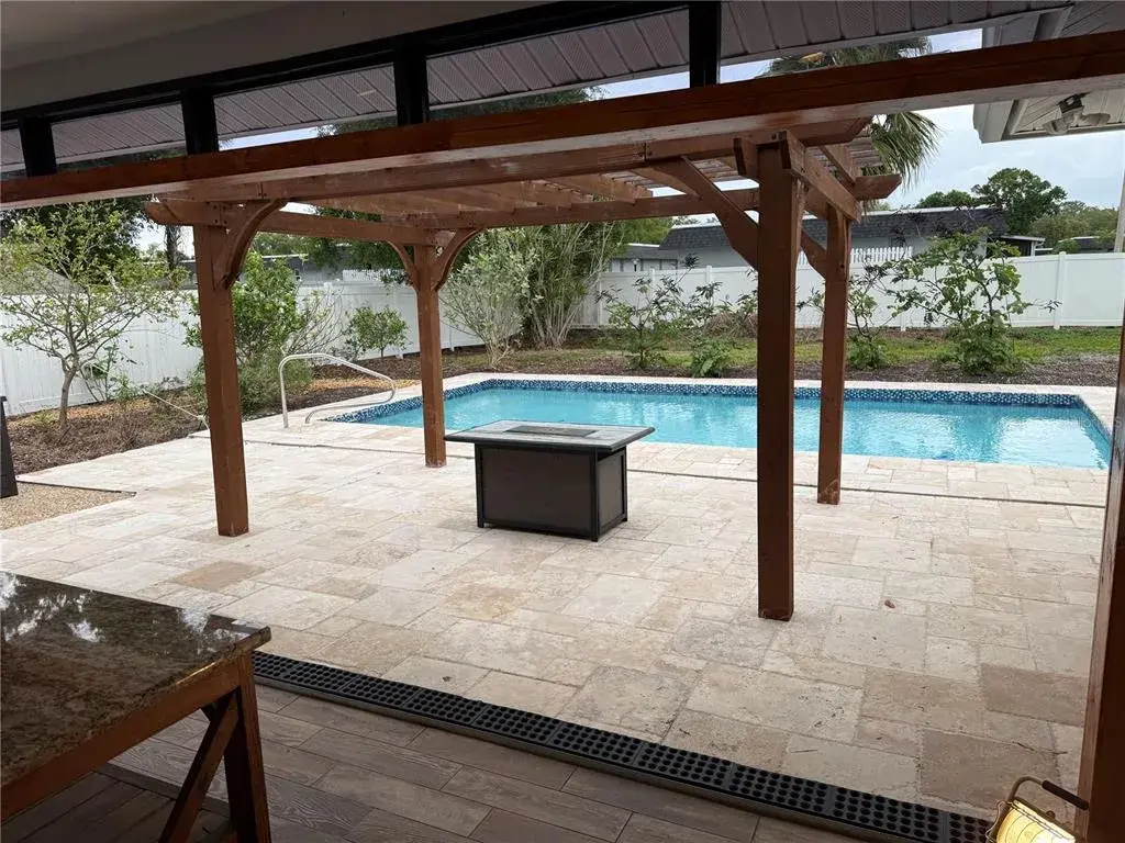 Travertine Decking / Wood Trellis