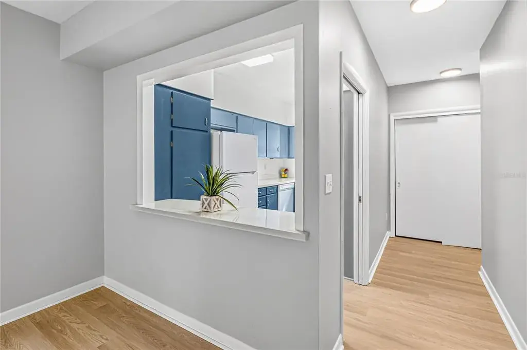 Front entrance with view of kitchen