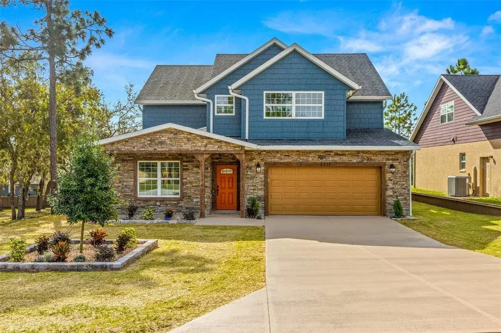 Stone features & full landscaping.