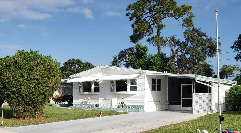 No Lot Rent—you own the land! New roof in Sept 2025 and a rare HOA-approved fenced yard for dogs.