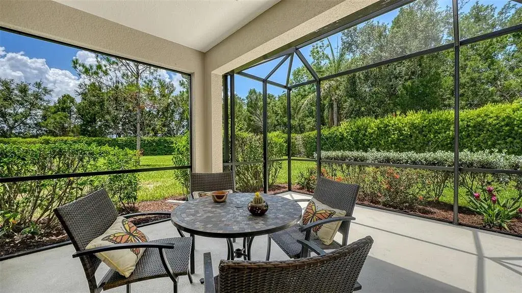 Overlooking a beautifully landscaped setting