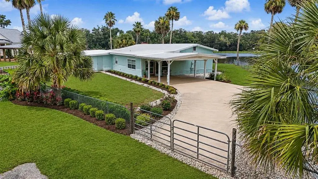 Virtually Staged Exterior to show paint/landscaping opportunity
