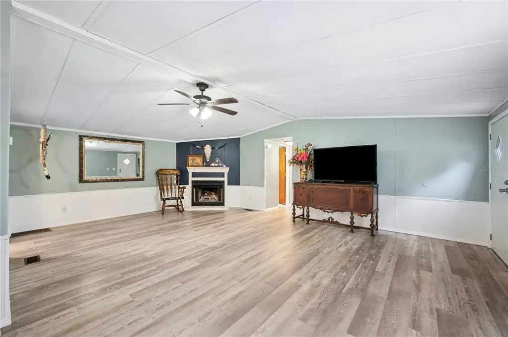 Living room with LVP flooring- no carpet!