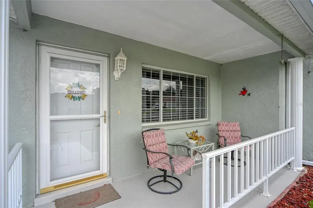 Sitting Area and Storm door for enjoying the Florida weather!