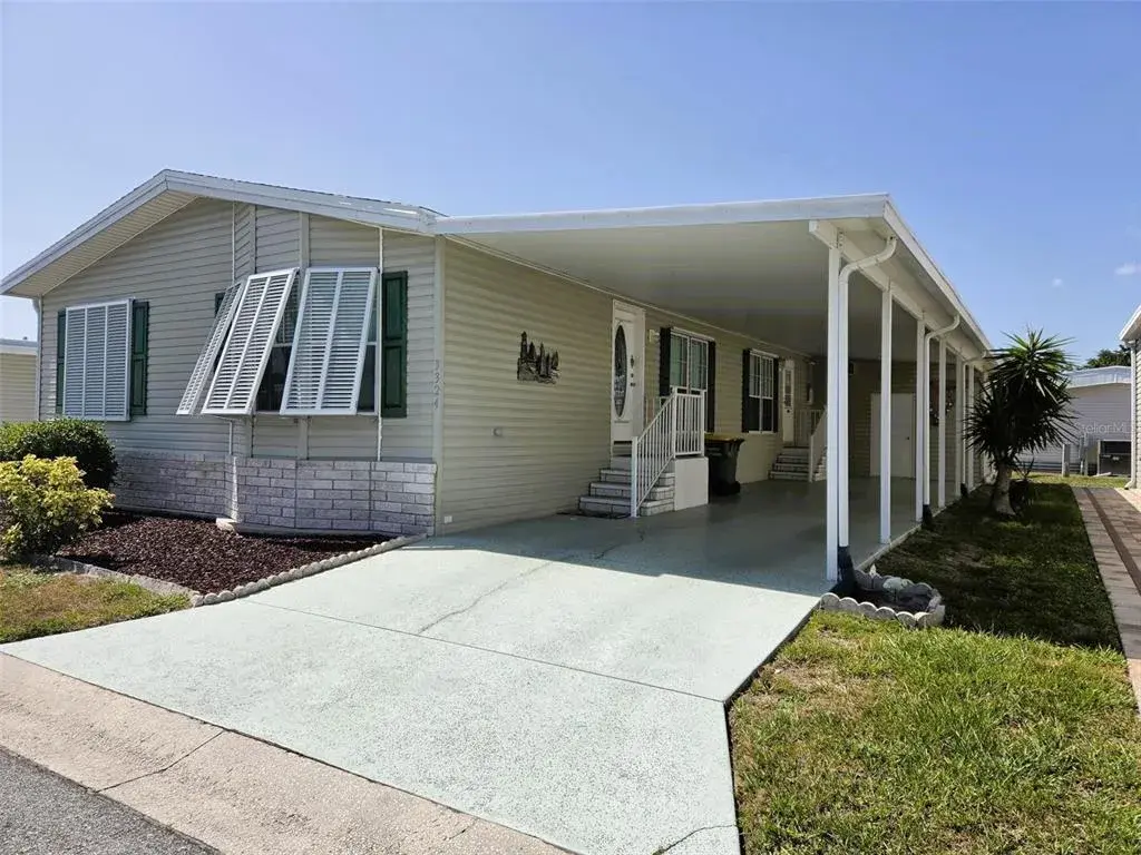 Carport View with 2 entrances to the home