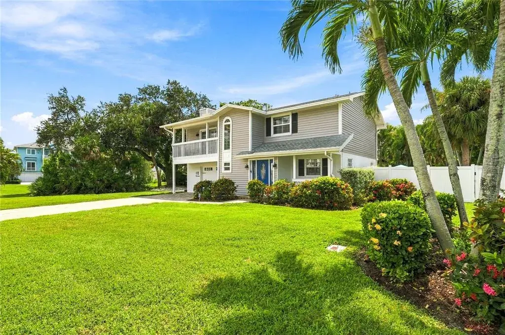 Huge Curb appeal with beautiful matured landscape!
