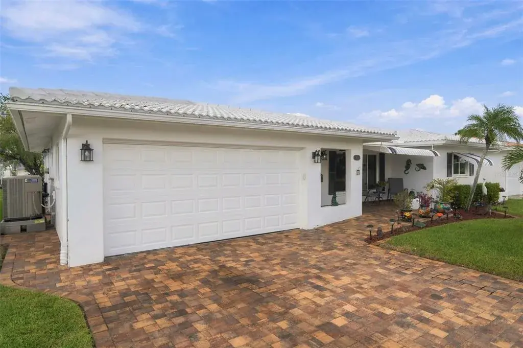 2 car garage and paver driveway