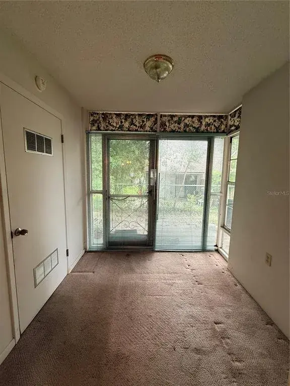 Property for sale at 155 N HILL AVENUE UNIT 80, DELAND, FL, 32724