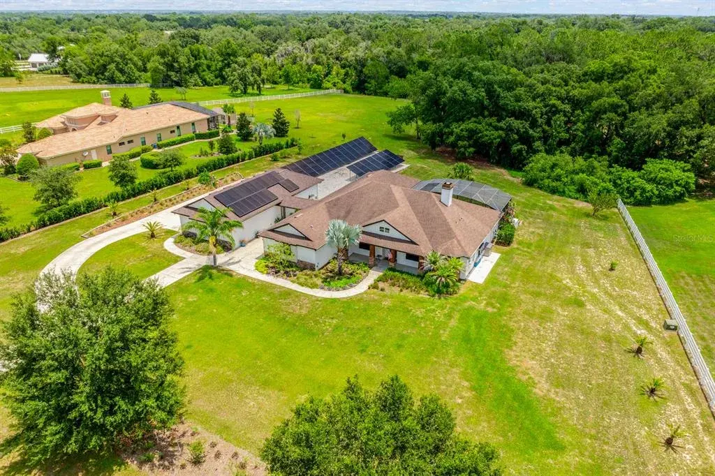 Set on 2.32 PICTURESQUE ACRES inside the GATED ~ EQUESTRIAN COMMUNITY of Beauclair Ranch Club, this CUSTOM BUILT ~ 6-bedroom / 4-bath ~ POOL HOME with a 4-car detached garage offers the perfect blend of privacy, luxury, and energy-efficient living!