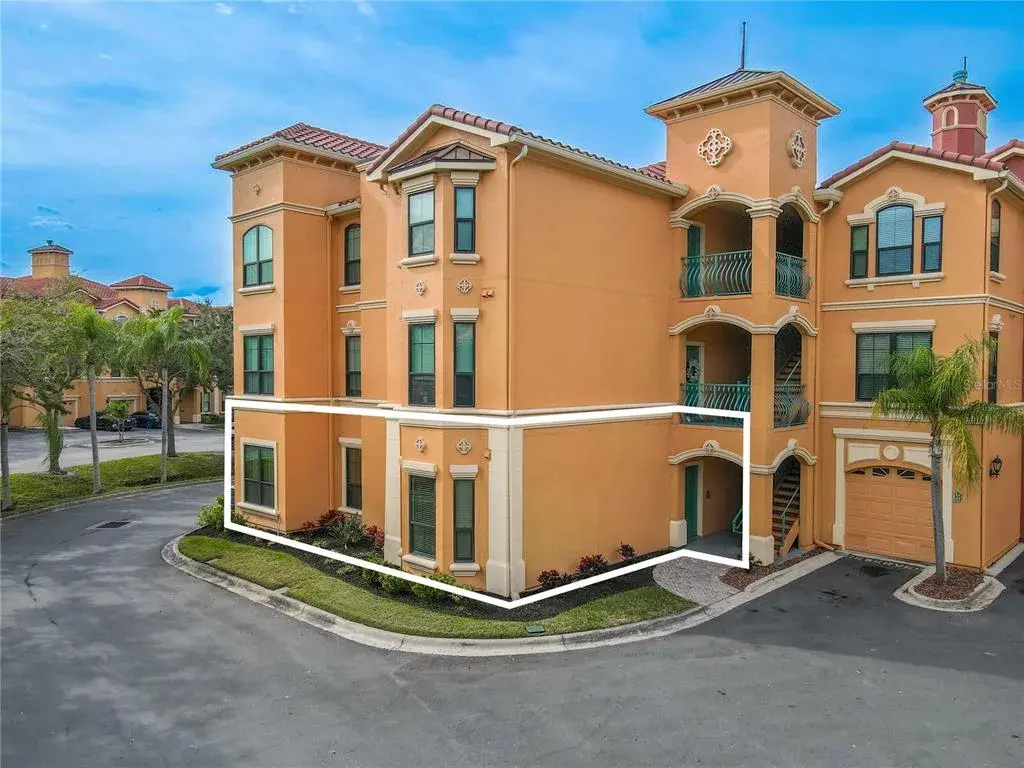 2 bedroom 2 bath den first-floor condo in Grand Bellagio at Baywatch, Mediterranean-inspired architecture and a desirable corner-style placement.