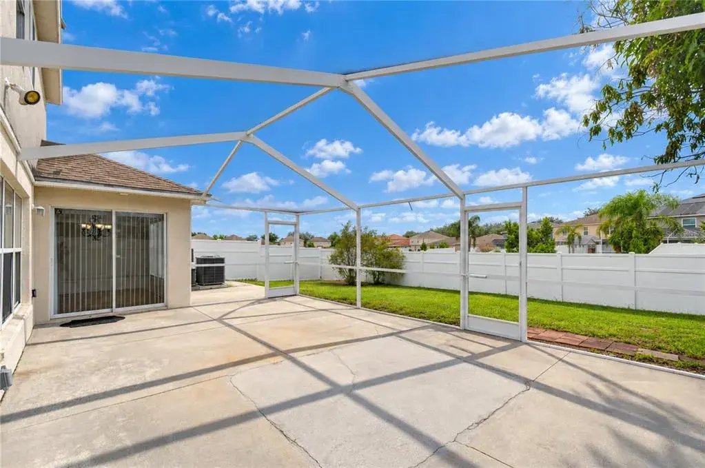 Oversized covered and screened lanai creates an expansive outdoor living area.