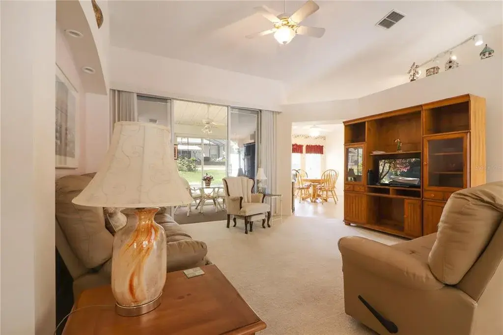 spacious living room with lanai access