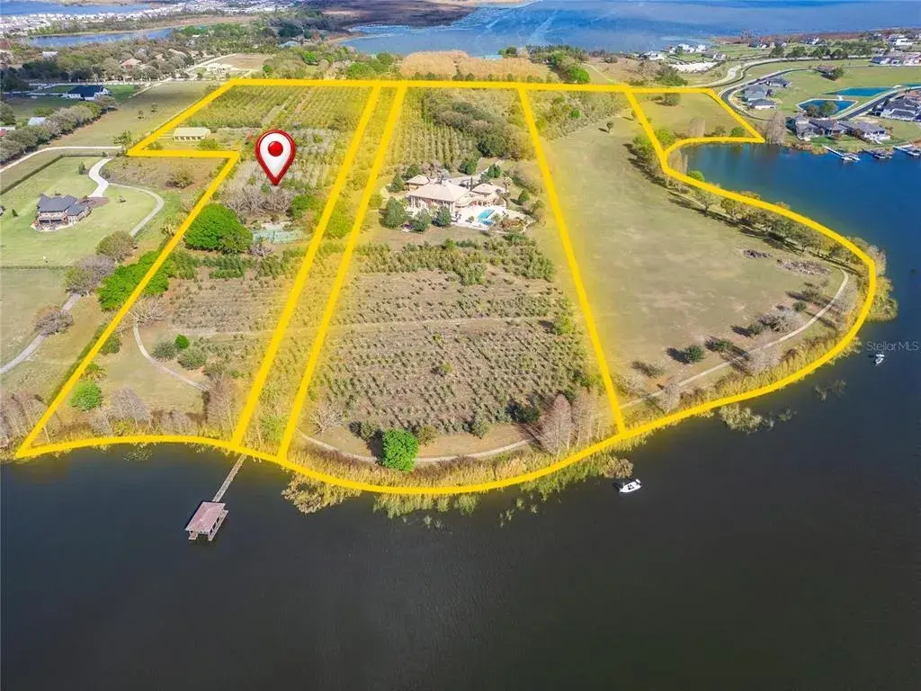 This parcel includes the tennis court, the barn, detached garage.
