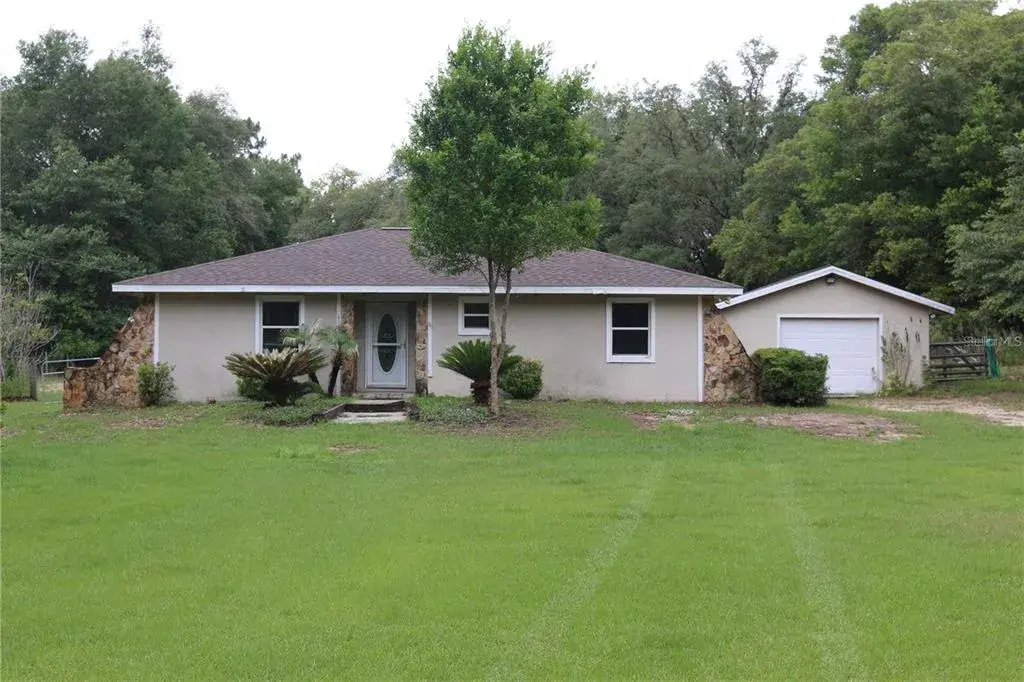 FROM  ENTRANCE 202ND CT LOOKING TO FRONT DOOR & ATTACHED GARAGE