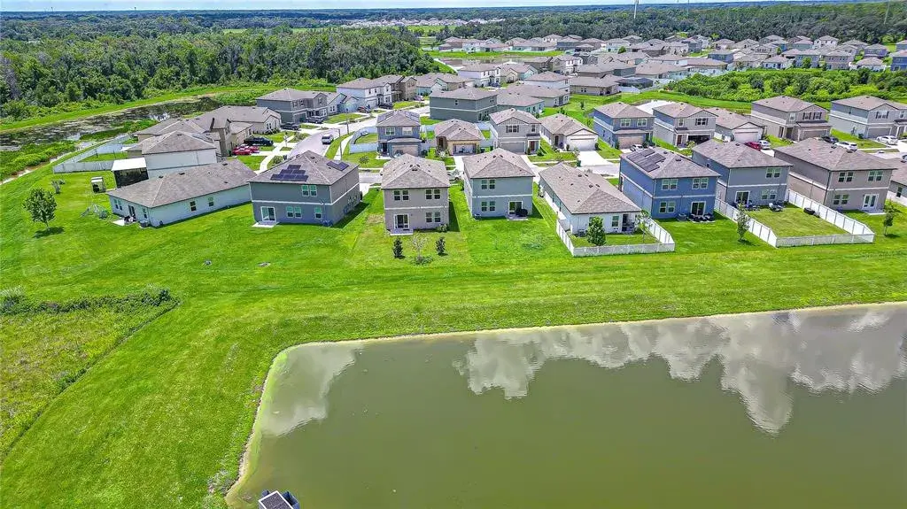 Peaceful pond views create a picturesque backdrop and tranquil outdoor setting