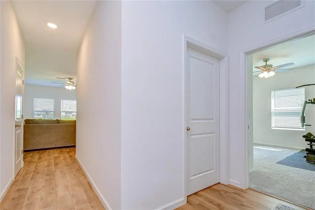 Beautiful vinyl plank flooring welcomes you into the main living areas