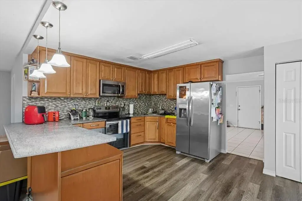 Upgraded kitchen with granite