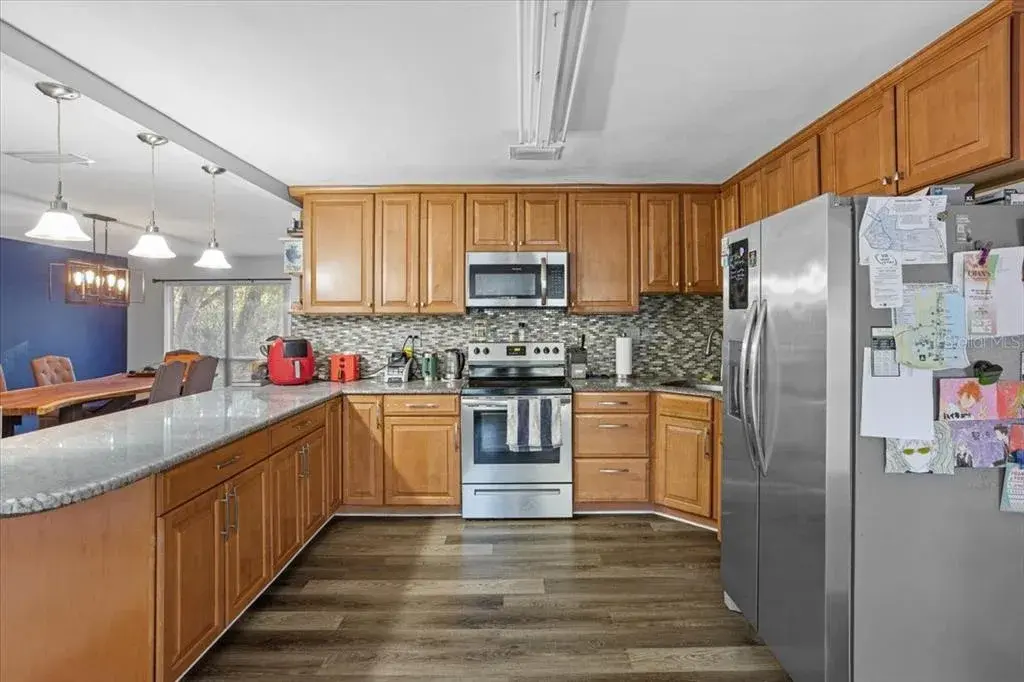 Upgraded kitchen with granite