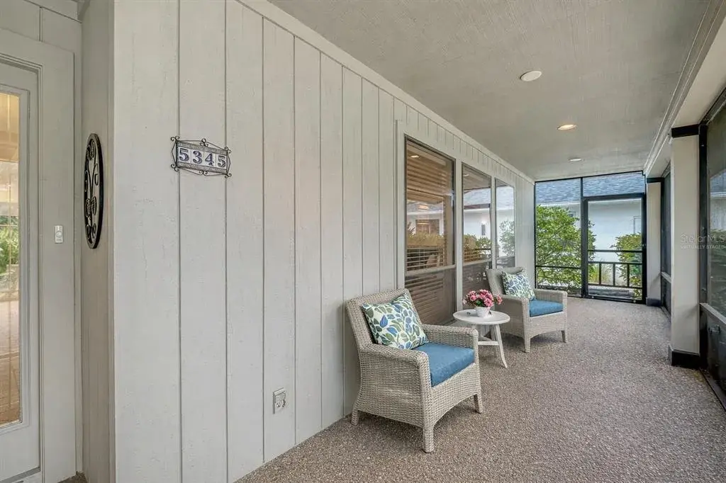 Virtually Staged.  Spacious Screened Front Porch