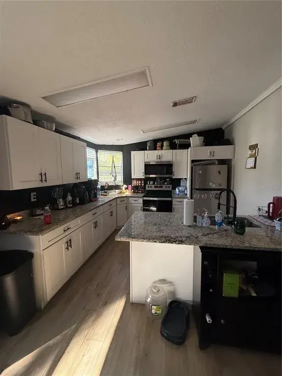 Property for sale at 8602 TREASURE ISLAND ROAD, LEESBURG, FL, 34788