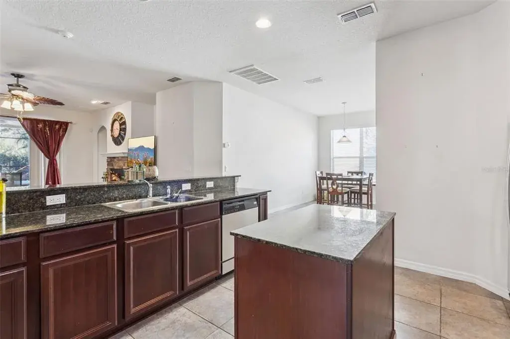 Center kitchen island providing additional prep space and functionality