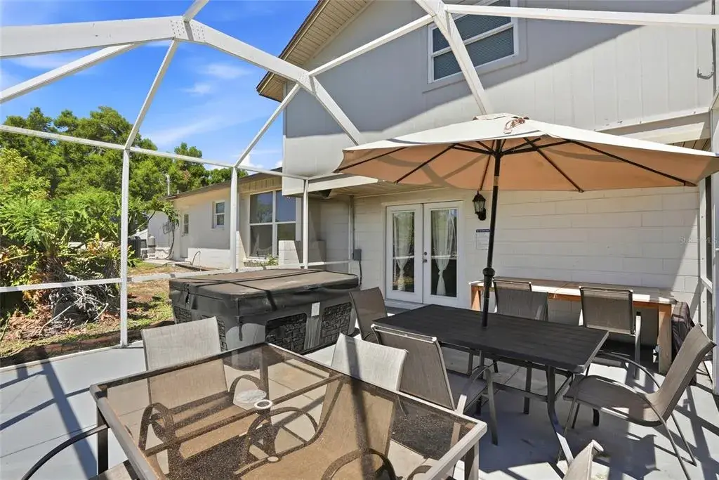 Patio w/ hot tub and patio furniture