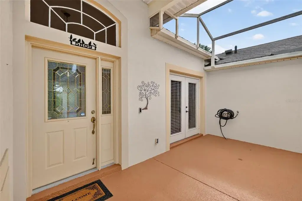 Courtyard. The double French doors lead to the kitchen.