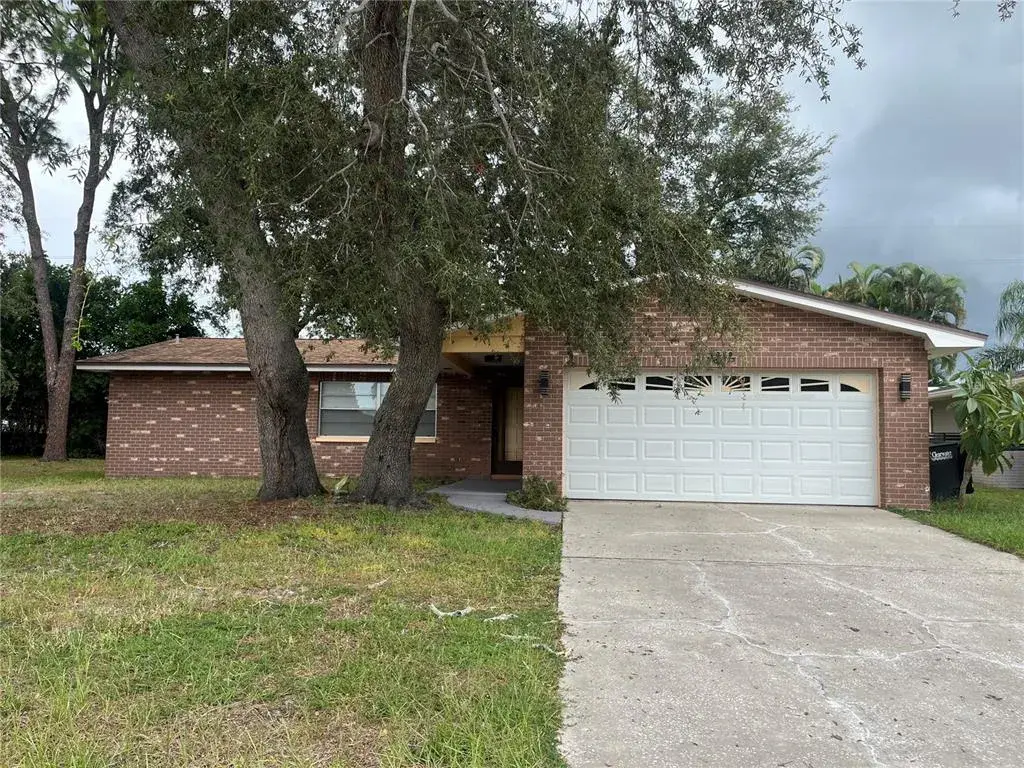 Completely Remodeled 3 bed/2bath/2 car garage brick ranch style home in Desirable Sun Tree Estates Clearwater, FL