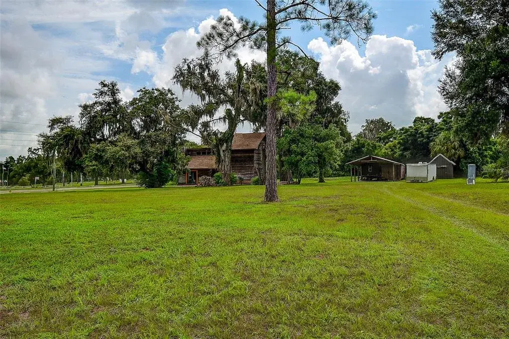 Home on Left, Outbuilding/Workshop on Right along with Garden Shed