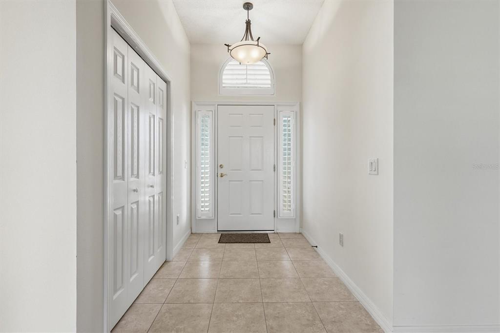 Foyer and Front Door with Coat Closet.