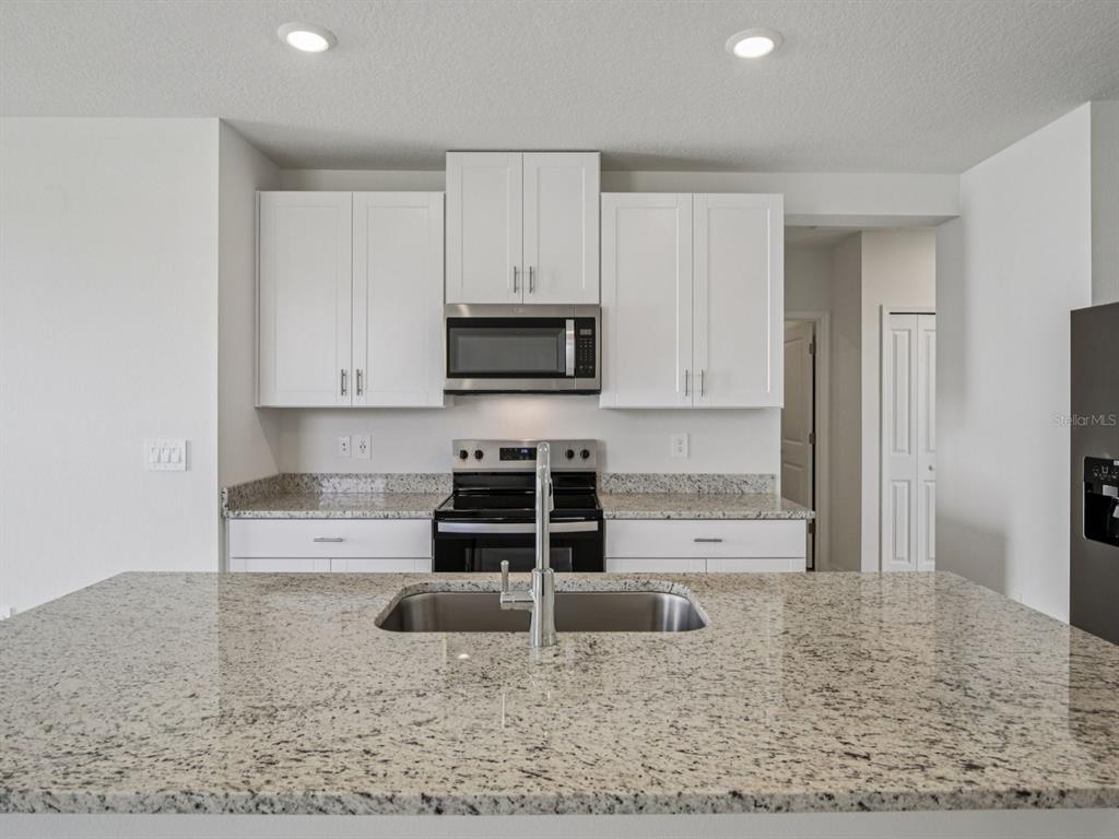 Photo is not of the actual home, but is an inspirational photo of builder’s model home and may depict options, furnishings, and/or decorator features that are not included