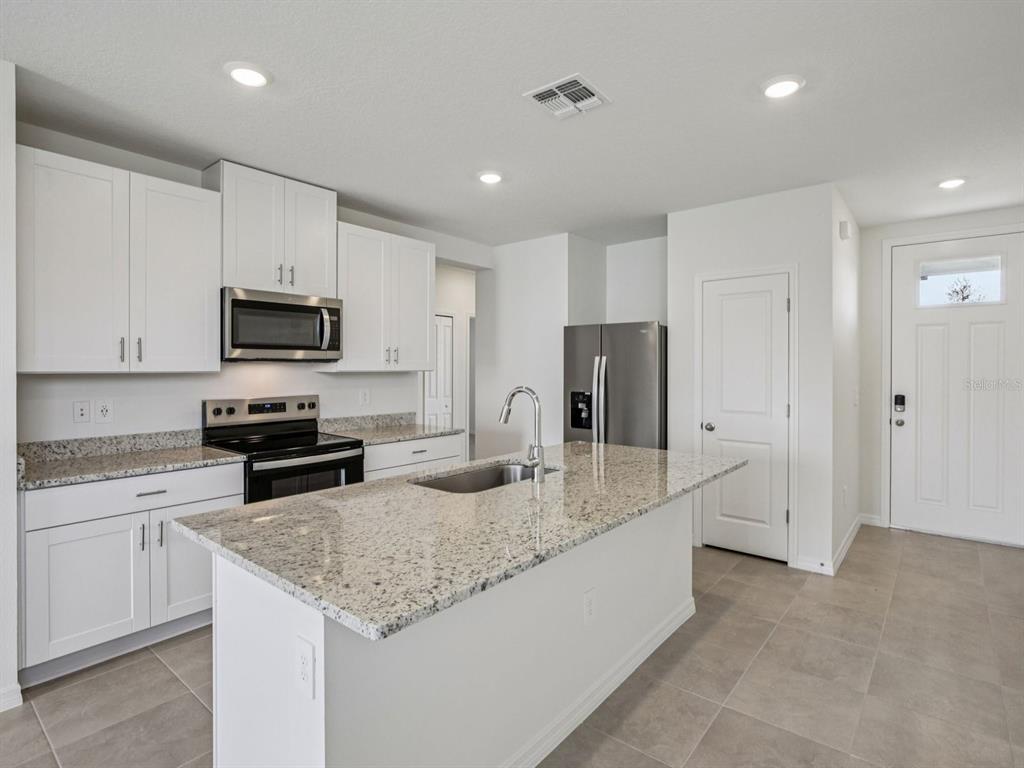 Photo is not of the actual home, but is an inspirational photo of builder’s model home and may depict options, furnishings, and/or decorator features that are not included