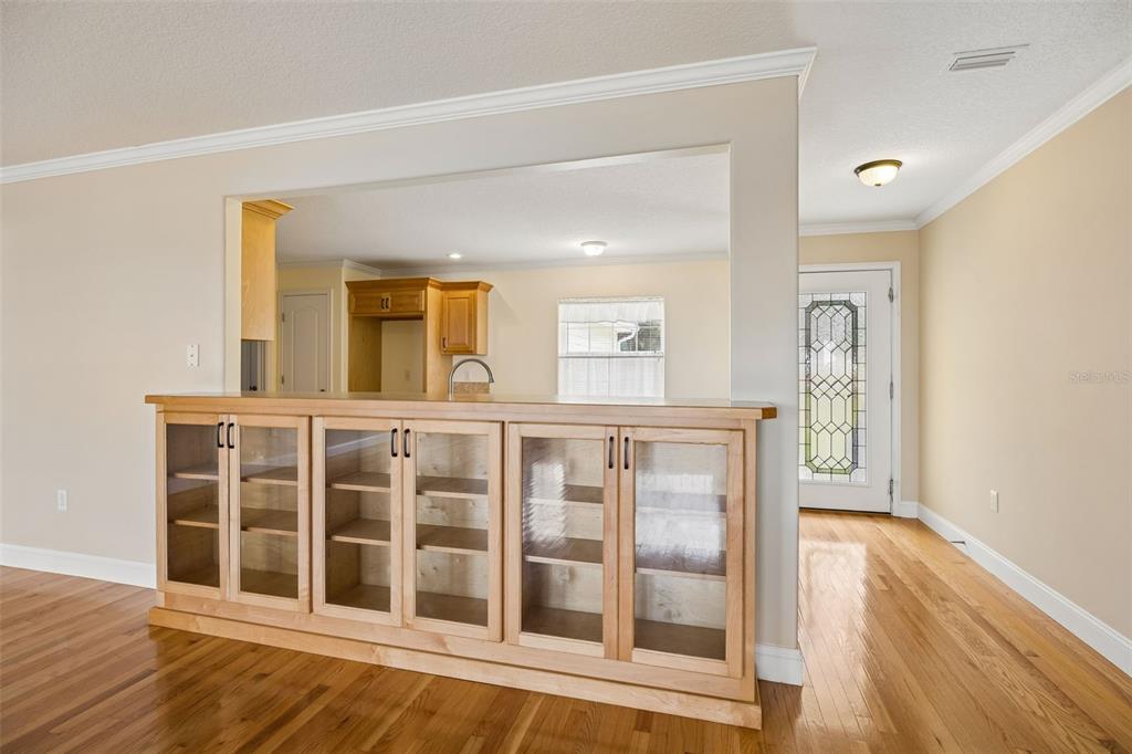 This built-in cabinet accents the dining area and shows the entry way