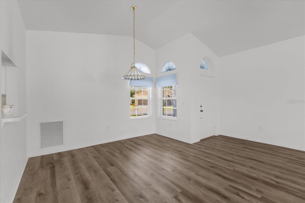 Dining room - living room combo - high ceilings