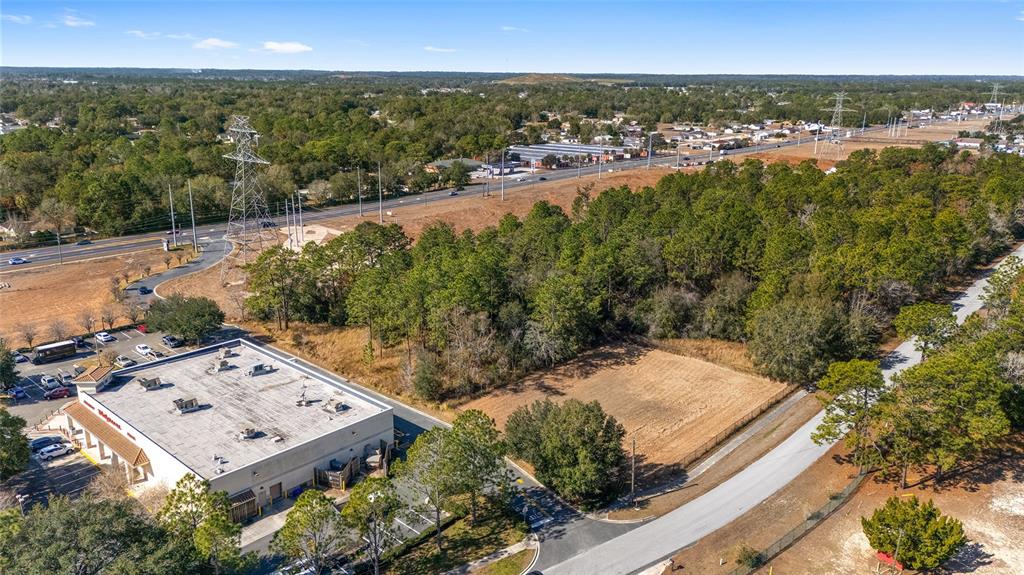 THE BACK OF WALGREENS AND THEIR DRA ON LOT 3, THE ENTRANCE ONTO MARICAMP IS ON LOT 3