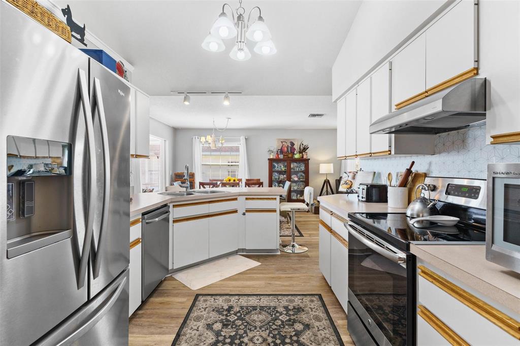 Kitchen overlooks Kitchen Nook/Dining area and family room