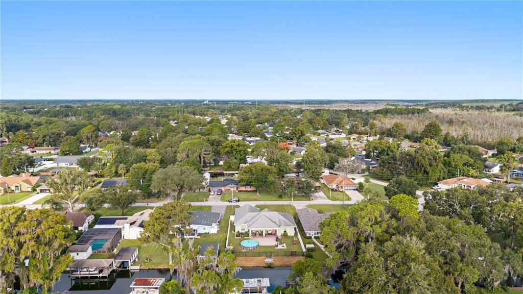 Back of the house with access to the canal that leads to Lake Eustis