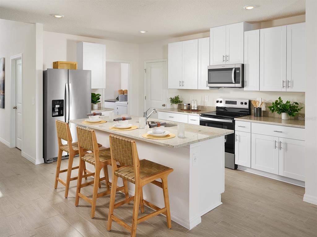 Photo is not of the actual home, but is an inspirational photo of builder’s model home and may depict options, furnishings, and/or decorator features that are not included.