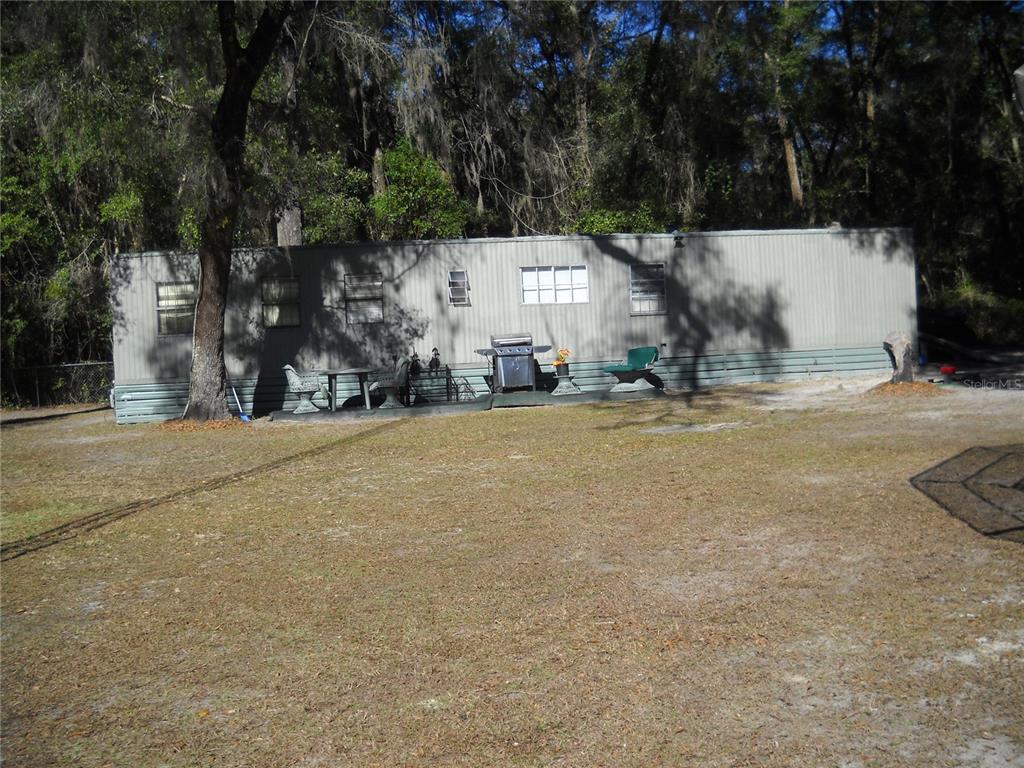 Middle S/W used for storage, back opens for mower.