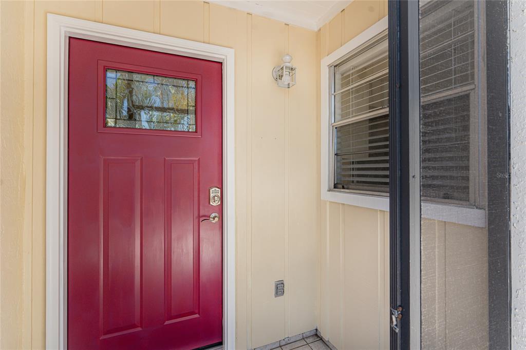 This bright and cheerful door welcomes you in!
