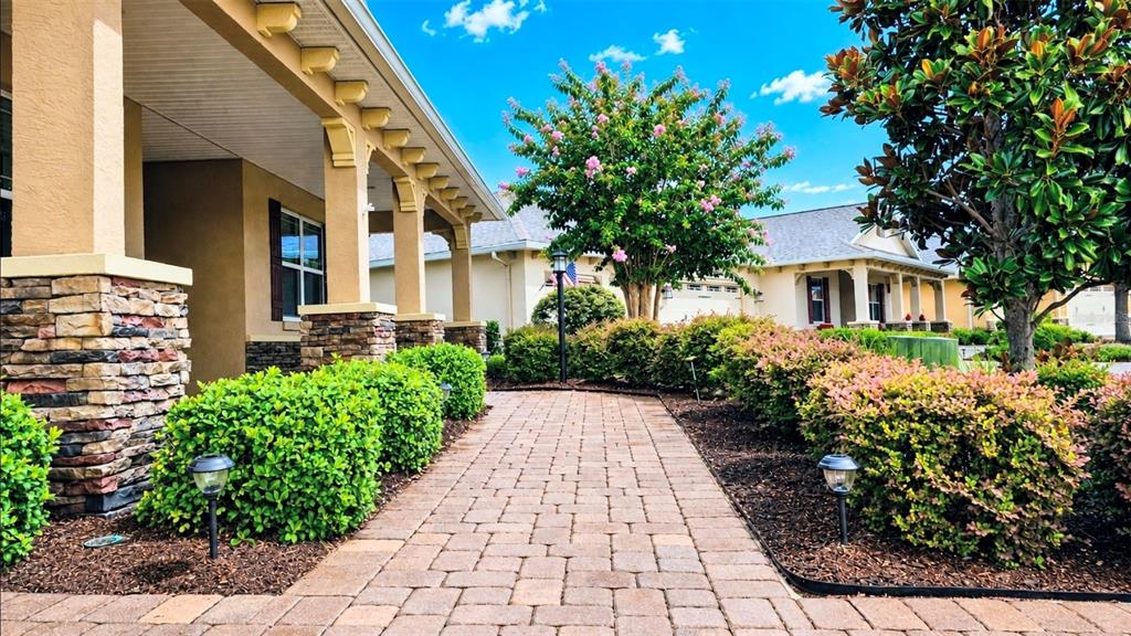 Grand Entry with Paver driveway, sidewalk, front patio, back lanai and back patio