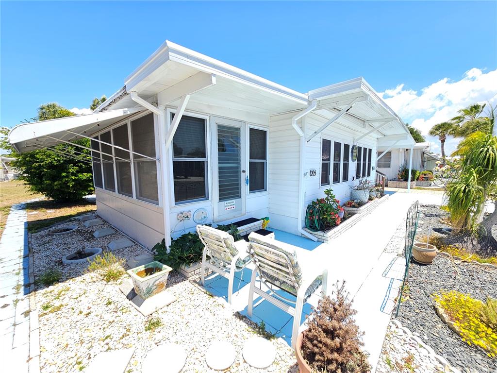 Florida room with front patio