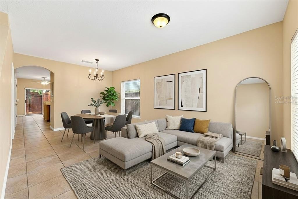 Open living and dining. Virtually Staged.