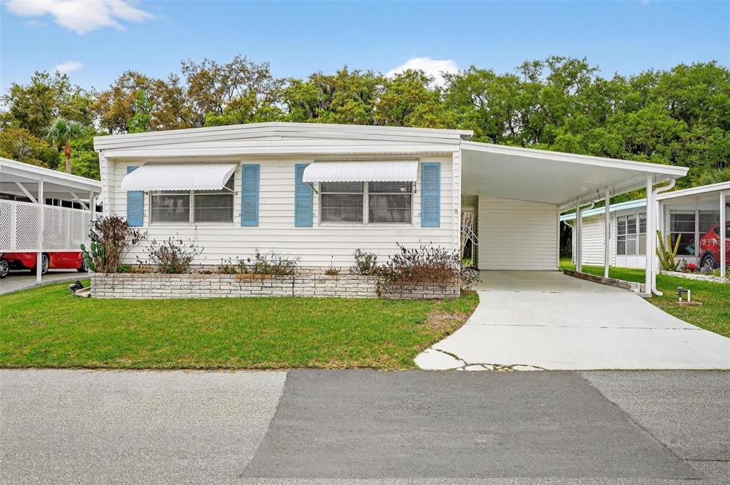Property for sale at 7 COCOS PLUMOSA DRIVE UNIT A, EUSTIS, FL, 32726